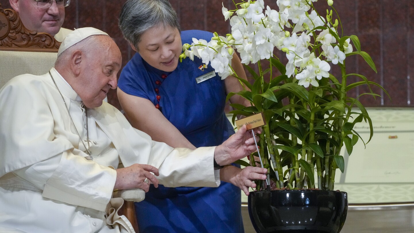 Pope marvels at Singapore’s skyscrapers and asks that the lowest migrant workers not be forgotten