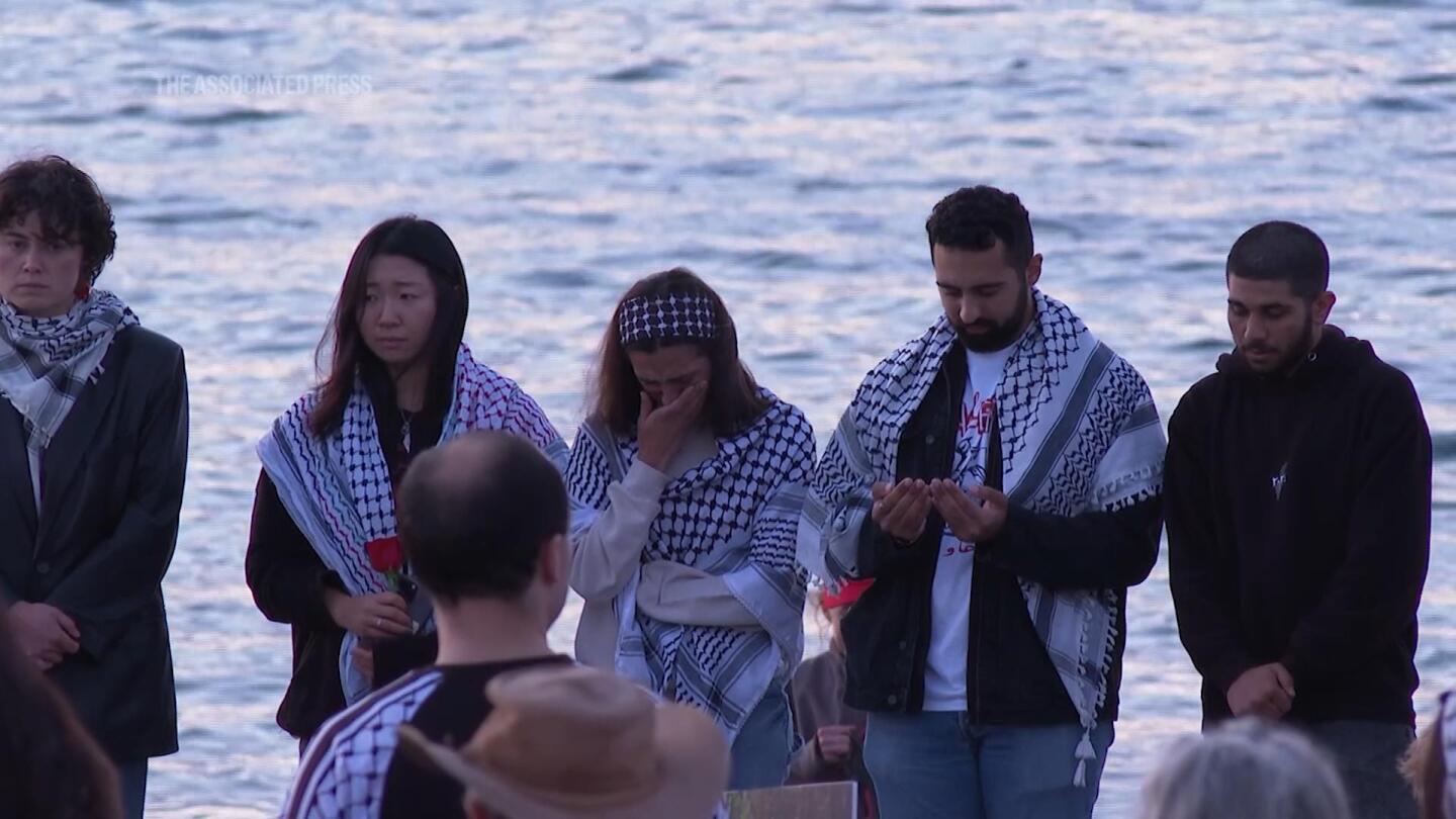 Hundreds gather on Seattle beach to remember American activist killed by Israeli military | AP News