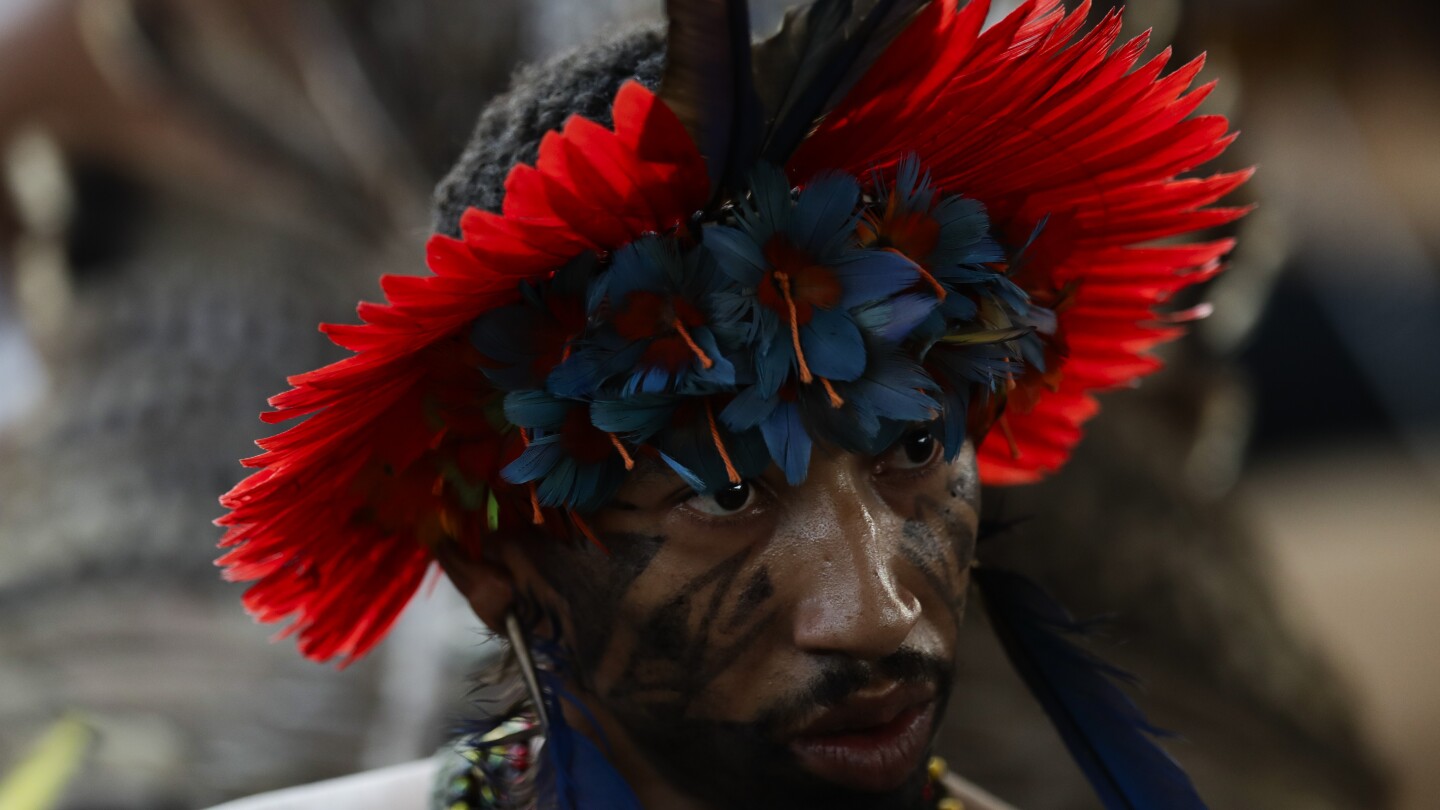 Brazil Indigenous group hails a sacred cloak’s homecoming after nearly four centuries in Europe