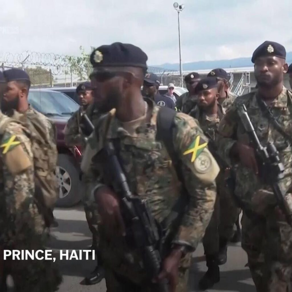 Jamaican soldiers and police arrive in Haiti to help fight gangs | AP News