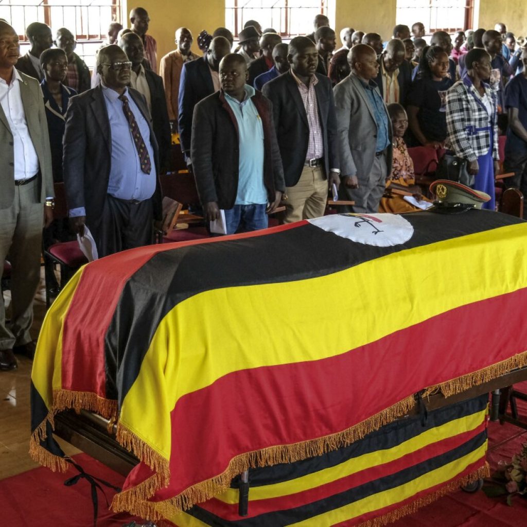 Mourners pay respects to Ugandan athlete who died after her partner set her on fire