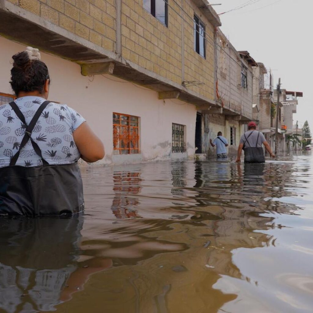 After over a month of living in black sewage waters, residents of Mexico’s Chalco remain anxious | AP News