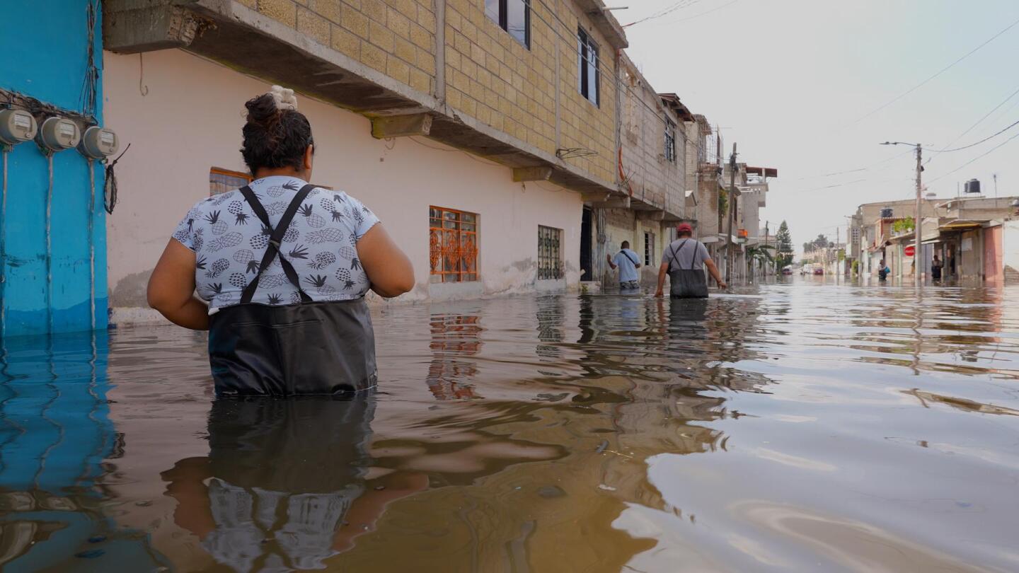 After over a month of living in black sewage waters, residents of Mexico’s Chalco remain anxious | AP News