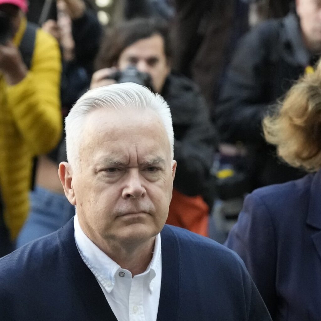 Former BBC presenter Huw Edwards arrives for sentencing hearing on indecent image charges