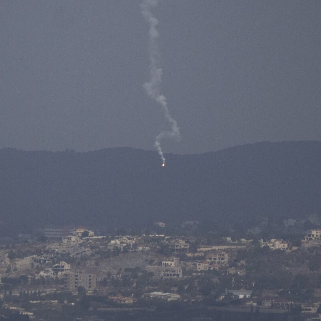 Israel says halting Hezbollah attacks is now a war goal as officials warn of a wider operation