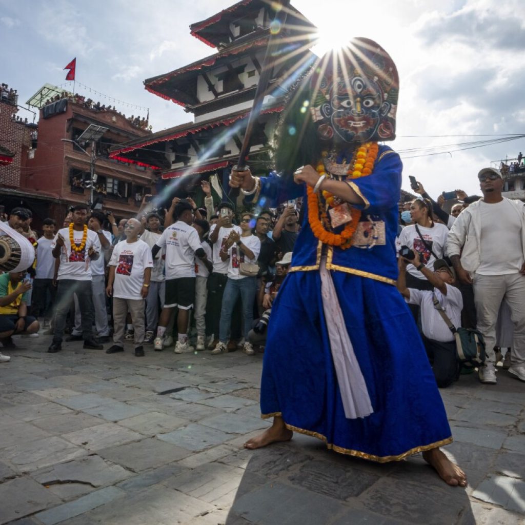 Festival season starts in Nepal with devotees honoring a living goddess