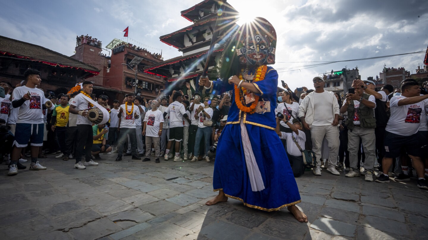 Festival season starts in Nepal with devotees honoring a living goddess