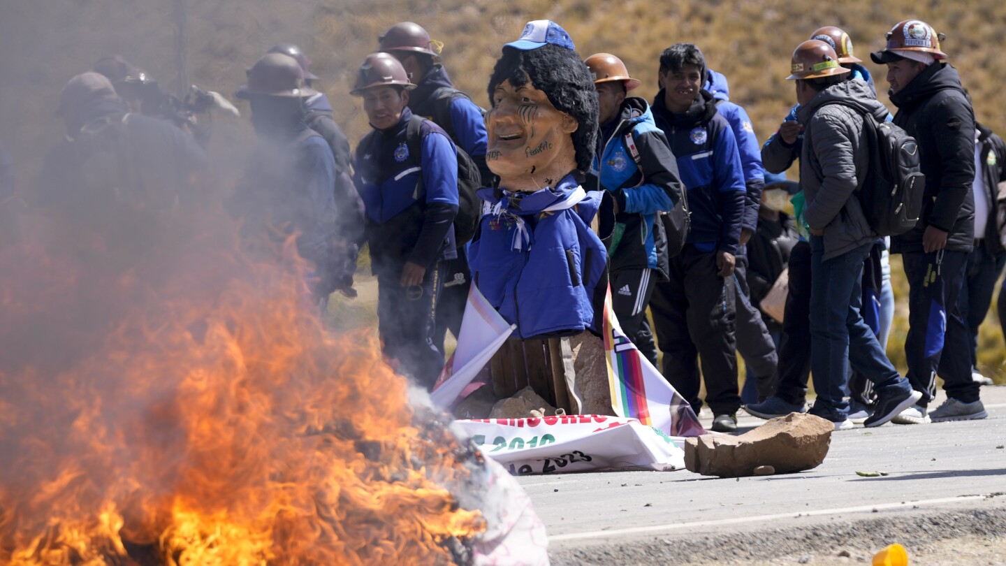 March for Bolivia’s ex-President Morales turns violent, as political crisis escalates