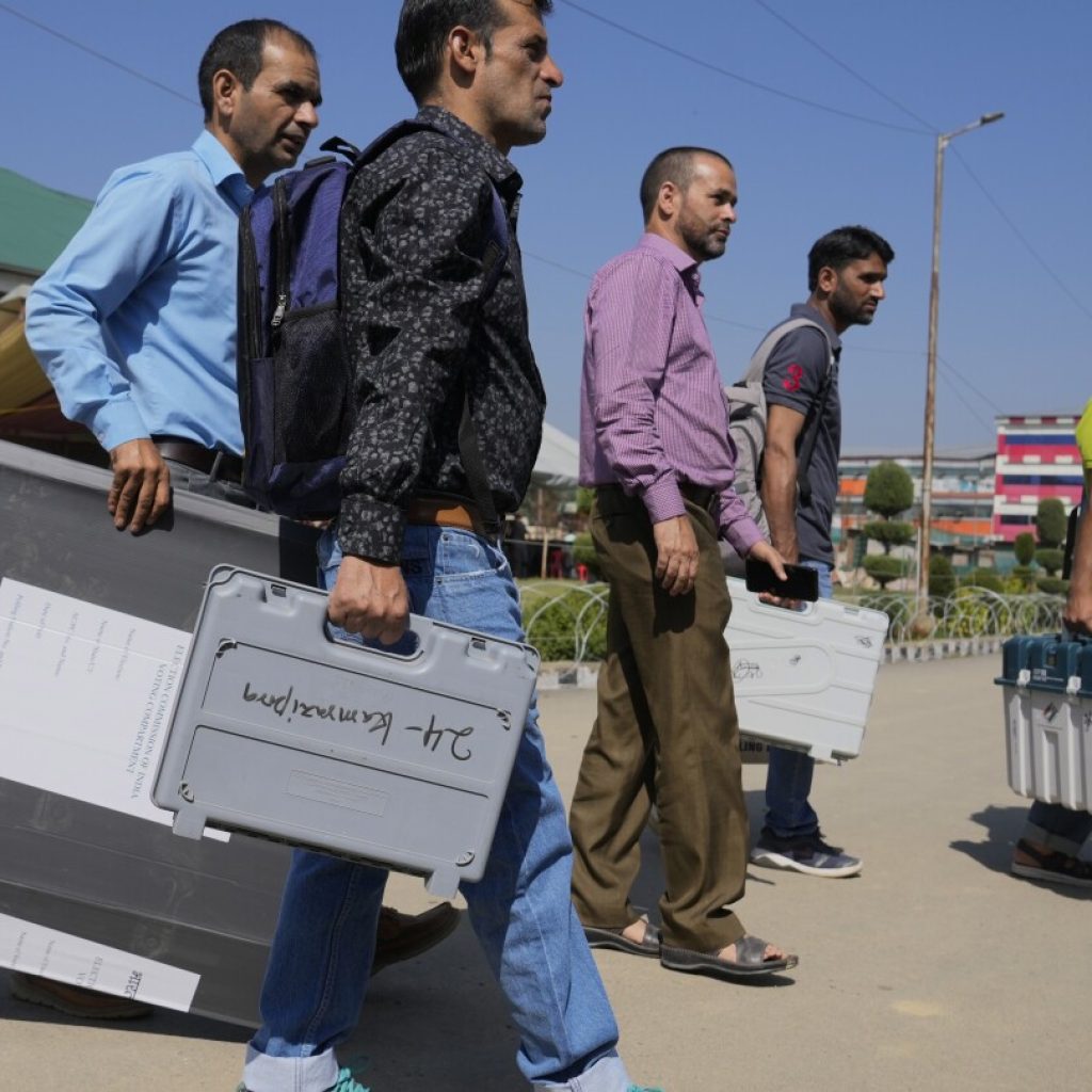 Voting for local government opens in Indian-controlled Kashmir for first time after losing autonomy