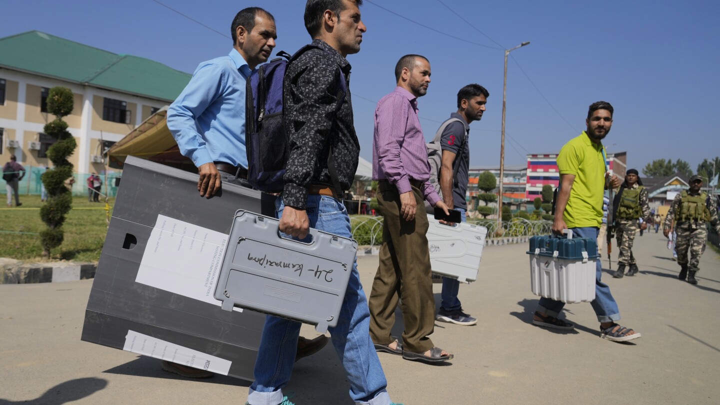 Voting for local government opens in Indian-controlled Kashmir for first time after losing autonomy