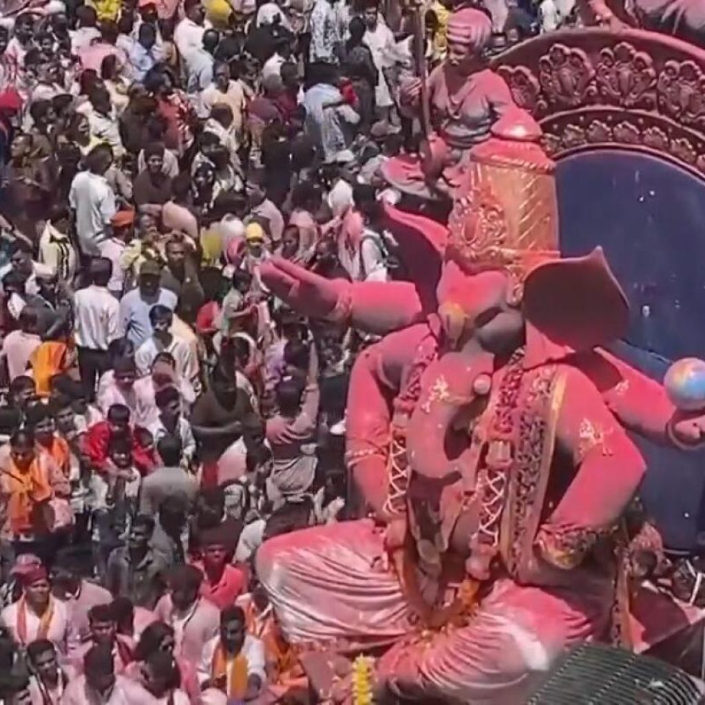 Huge crowd of Hindu faithful celebrates birthday of elephant-headed god Ganesha | AP News