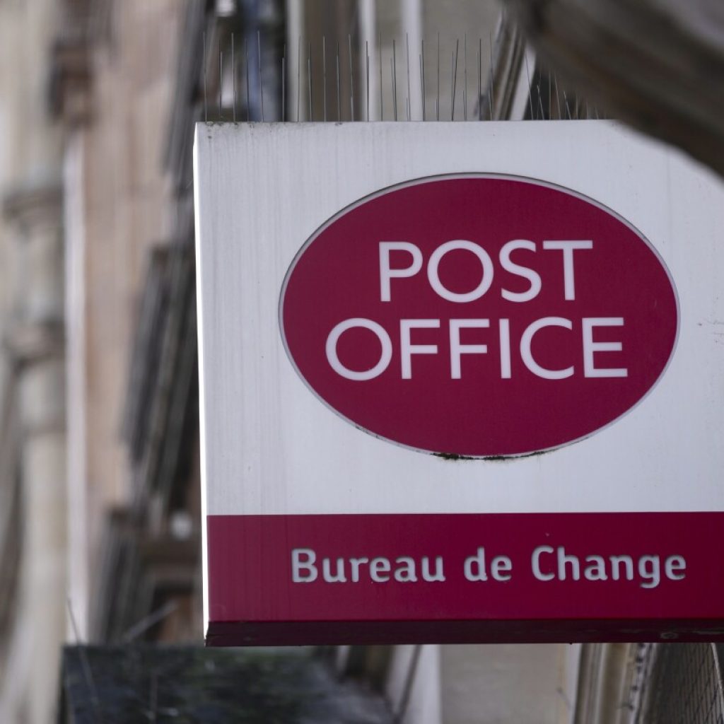 Britain’s CEO of scandal-ridden Post Office will step down next year