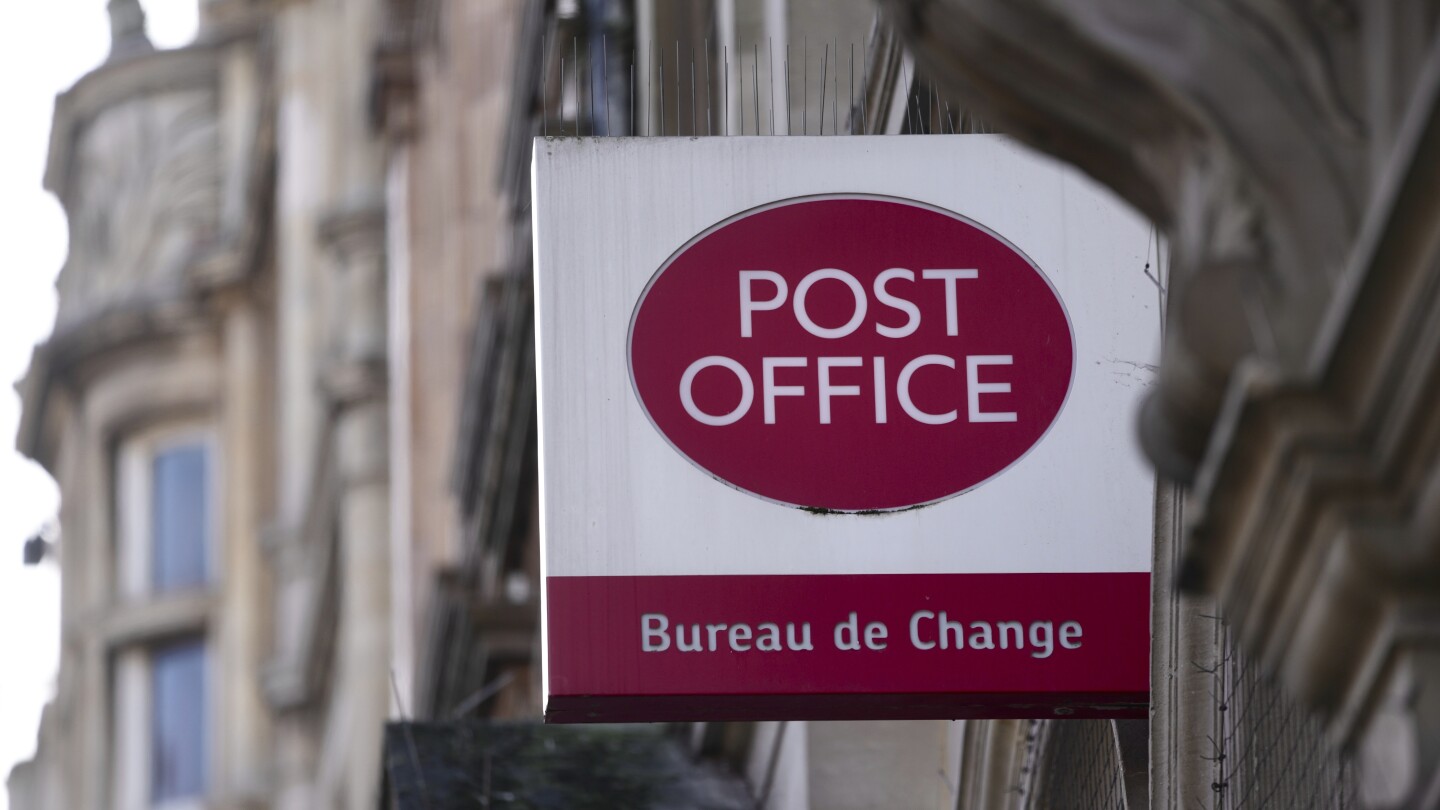 Britain’s CEO of scandal-ridden Post Office will step down next year