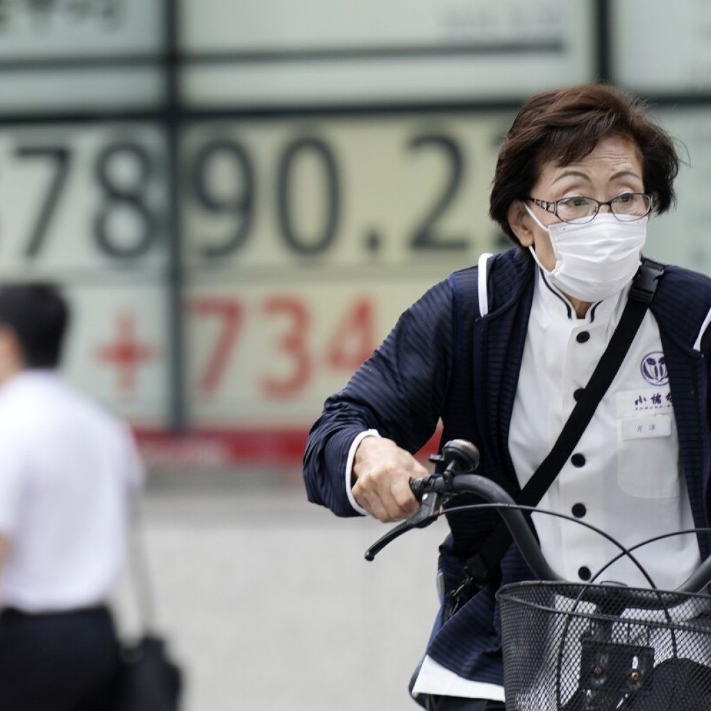 Asian stocks follow Wall Street’s rate-cut rally higher, as BOJ stands pat