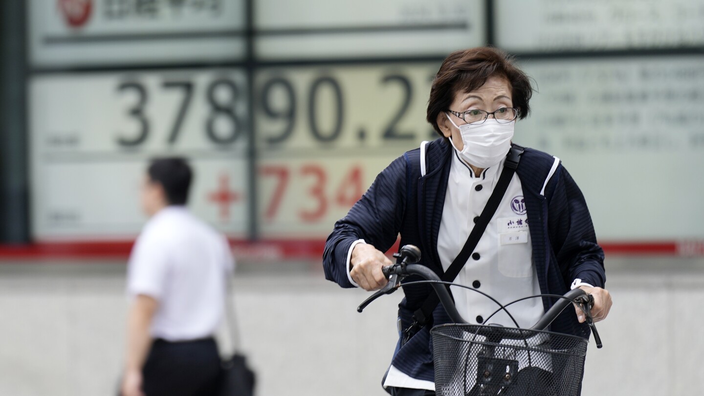 Asian stocks follow Wall Street’s rate-cut rally higher, as BOJ stands pat