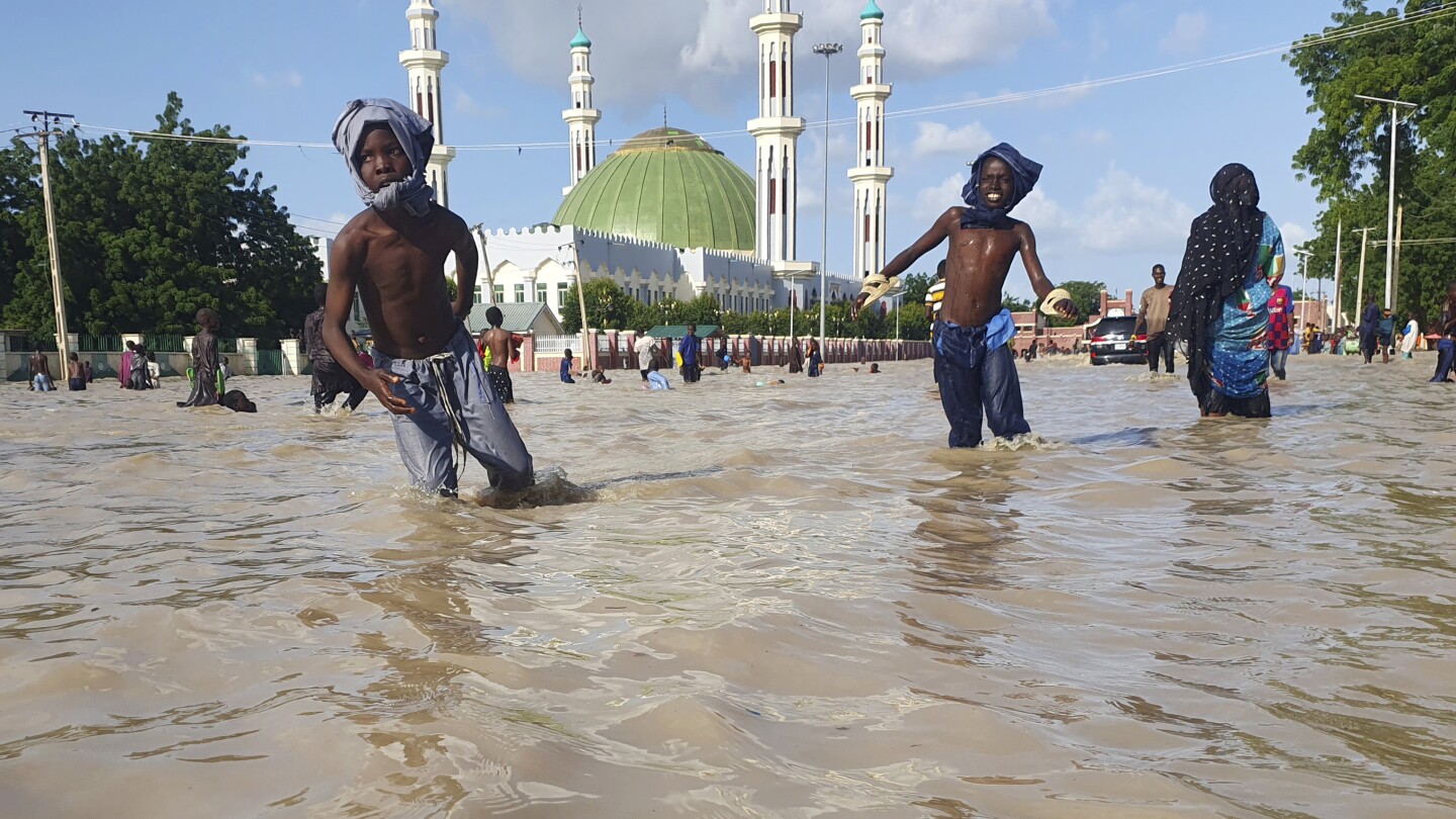 ‘Water is flooding everywhere’ as torrential rains sweep through West and Central Africa