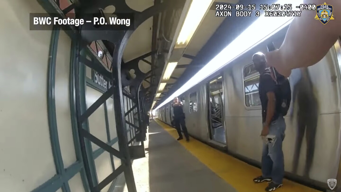 Footage shows NYPD officers firing at man with knife in subway shooting that wounded 4