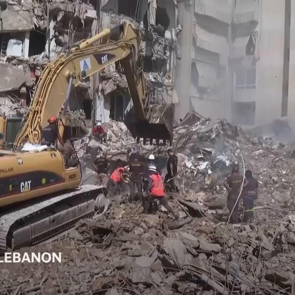 Beirut suburb wakes up to collapsed buildings after Israeli airstrike kills 31 | AP News