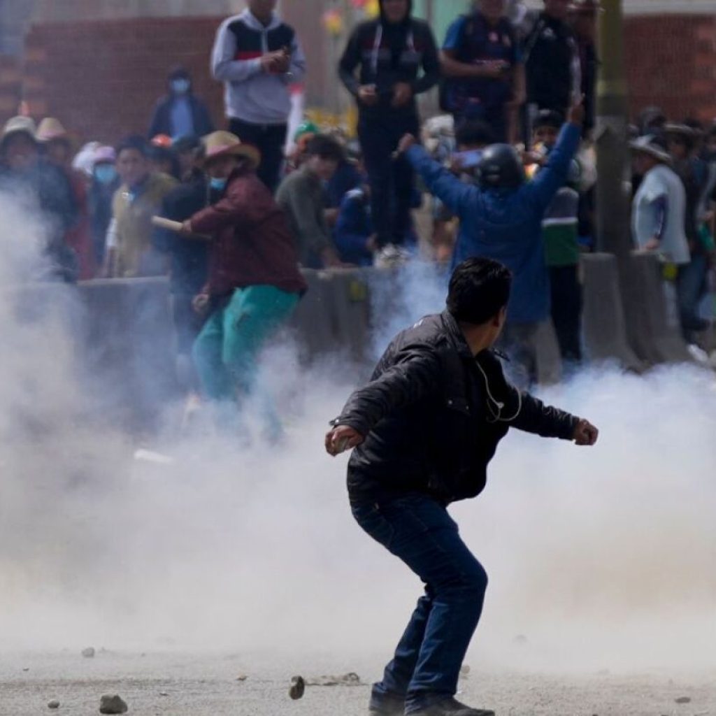 Rival factions clash as march led by former president Evo Morales advances in Bolivia | AP News