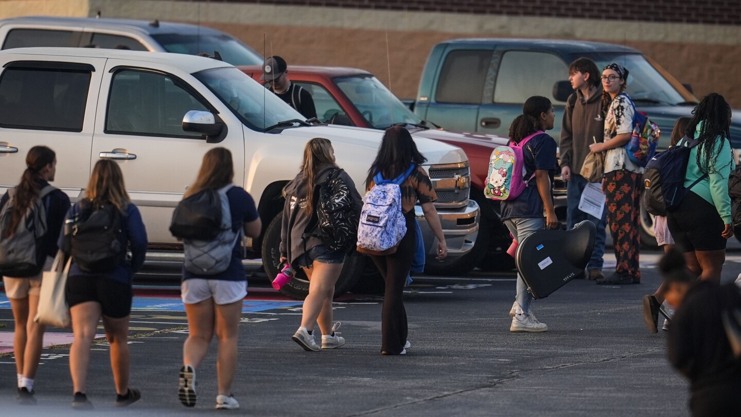 Weeks after a school shooting, students return for classes at Apalachee High School