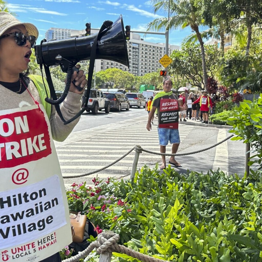 Union workers at Hawaii’s largest hotel go on strike