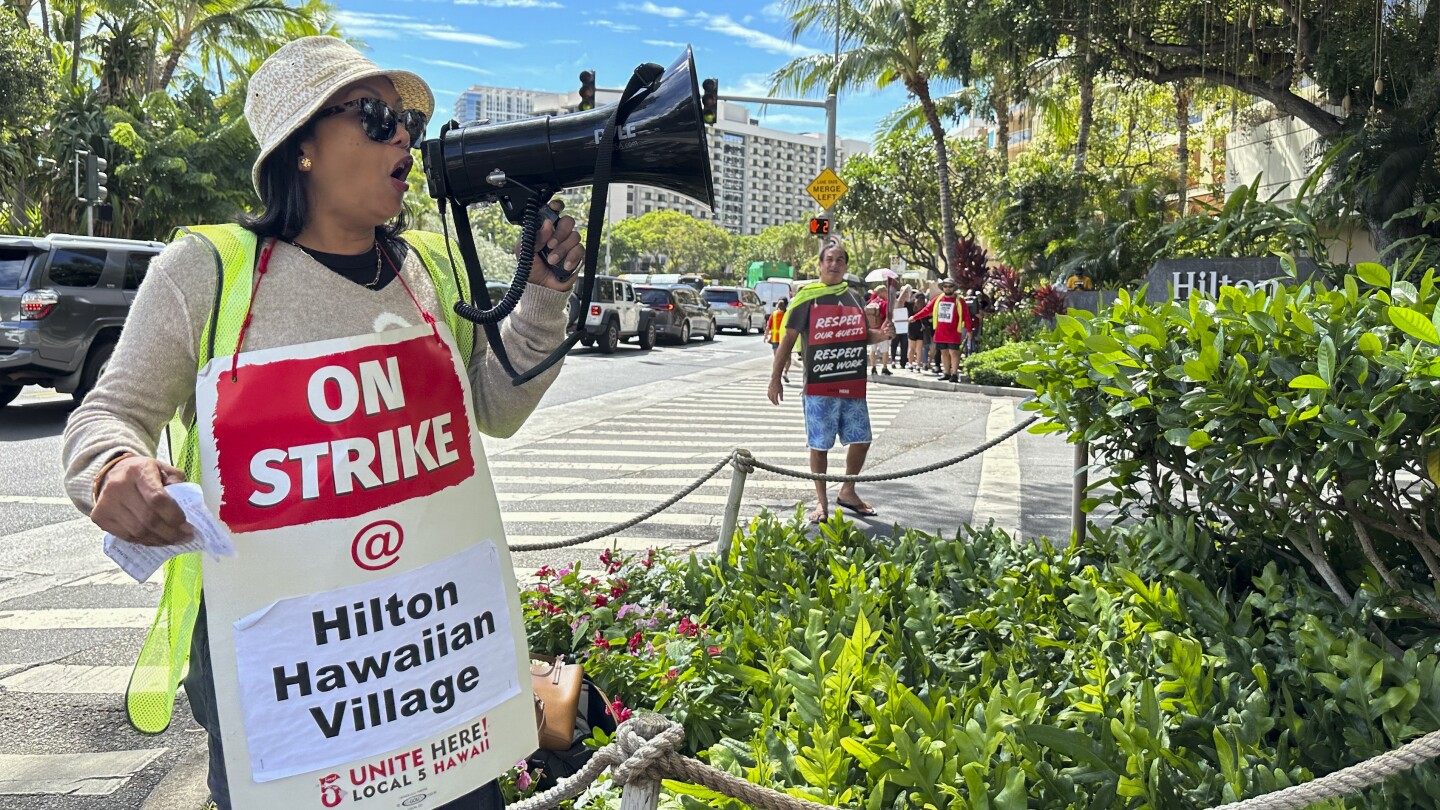 Union workers at Hawaii’s largest hotel go on strike