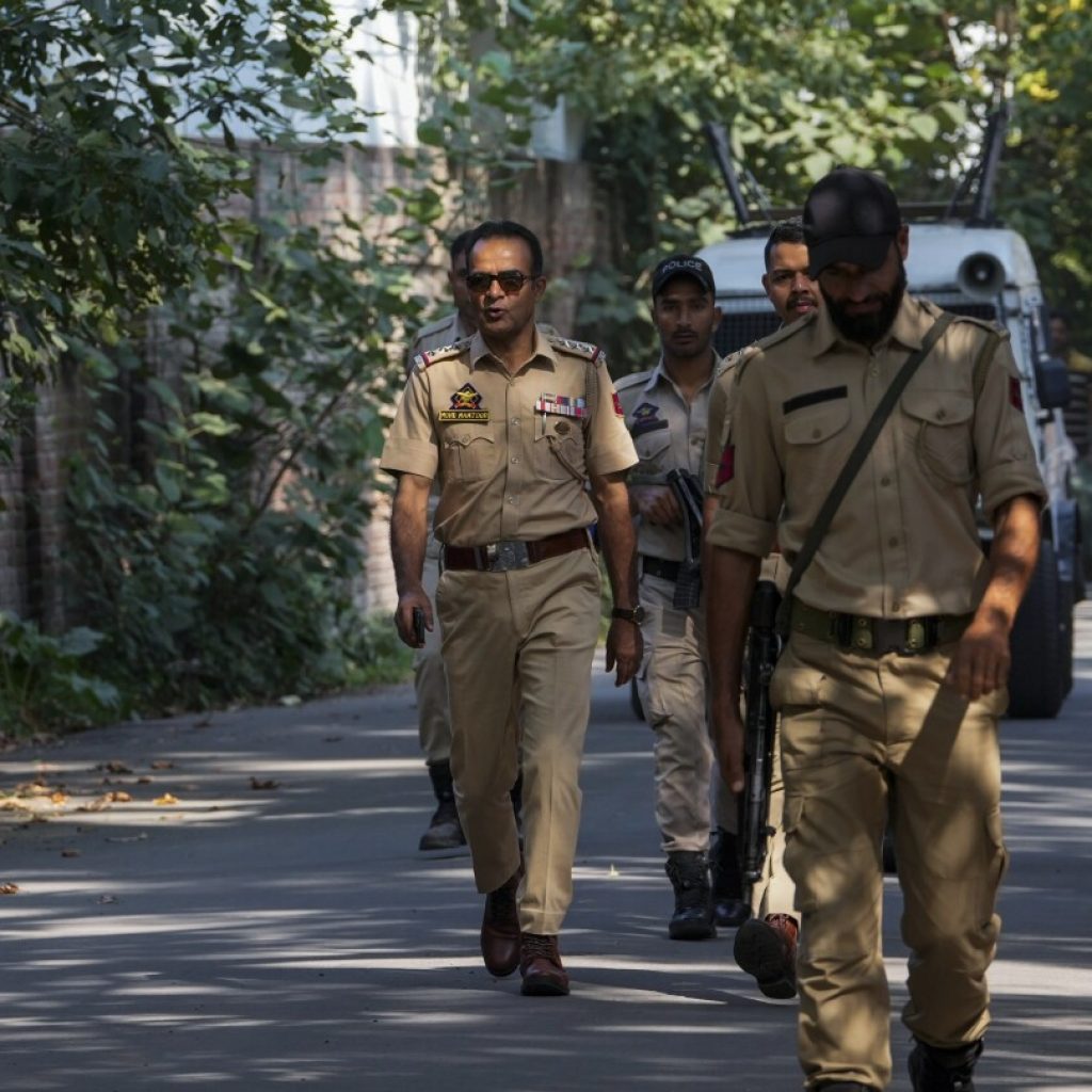 Residents in India-controlled Kashmir vote in the second phase of polls surrounded by heavy security